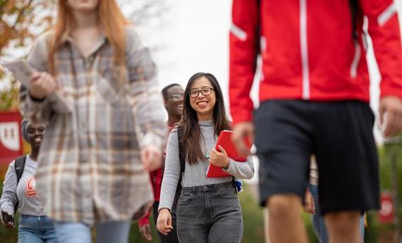 Group of 51 international students walking on campus